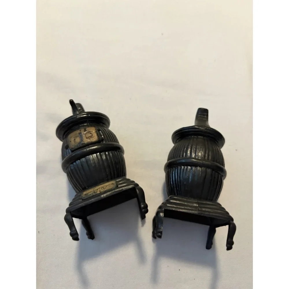 Salt and Pepper Shakers Potbelly Stove Vintage Black Gold Plastic Novelty